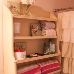Old Cabinet about toliet in bathroom via Unexpected Elegance