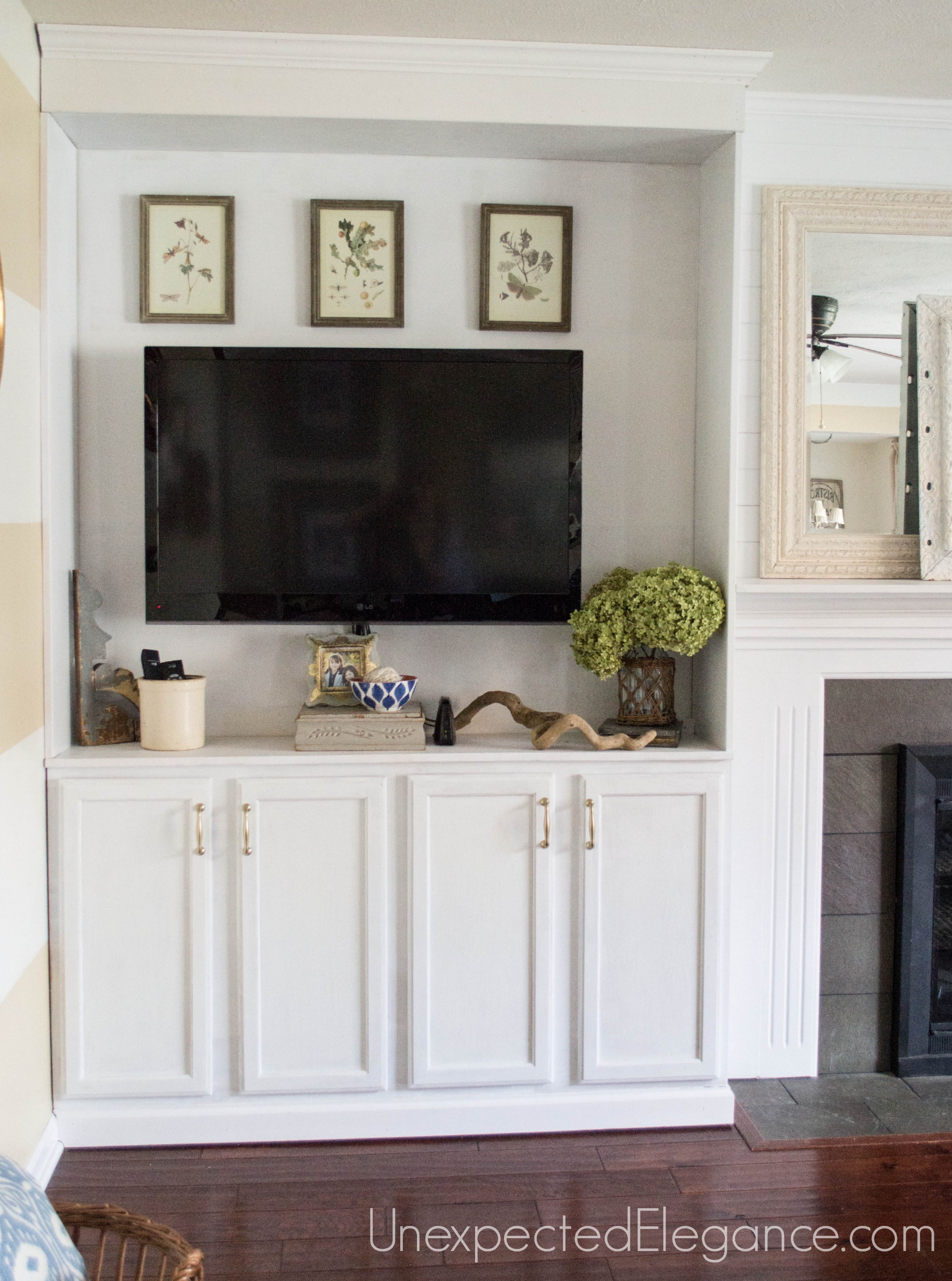 See how to transform you your living room with DIY fireplace built-ins! It completely changed the look of the space and made it feel bigger.