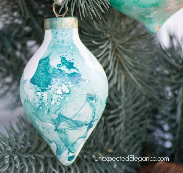 DIY Watercolor Ornaments Using Nail Polish.  These take a minute to make and is a lot of fun for the kids!