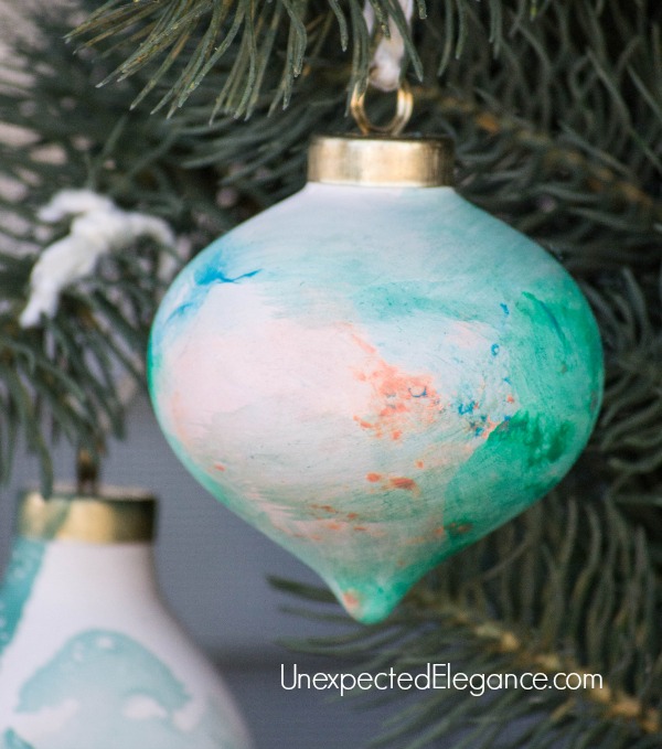 DIY Watercolor Ornaments Using Nail Polish.  These take a minute to make and is a lot of fun for the kids!