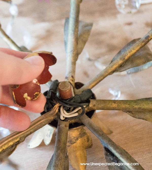 Have you ever bought a light fixture at a thrift store, yard sale or Craigslist that you absolutely loved but the wiring was entirely TOO SHORT?!?!  See just how easy it is to rewire a lighting fixture and save some money!