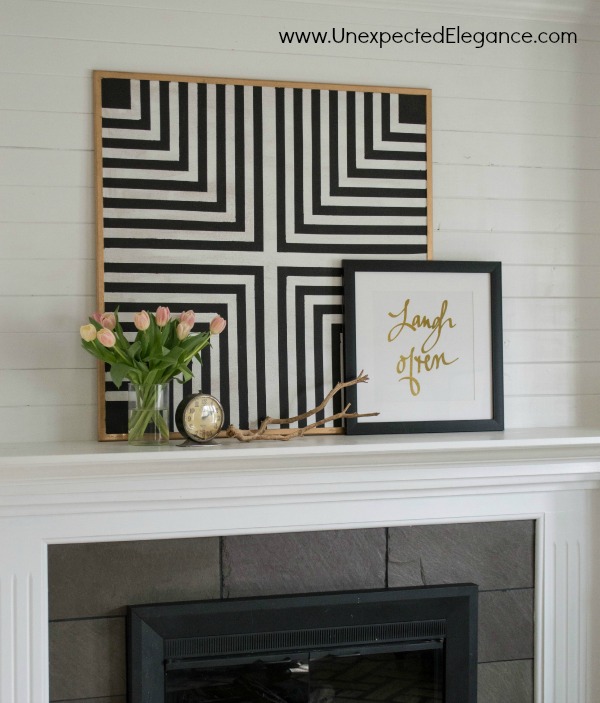 Black and White Bulletin Board-1-10Need some inexpensive artwork that can function as a bulletin board?  Get a full tutorial for making your own DIY geometric artwork!