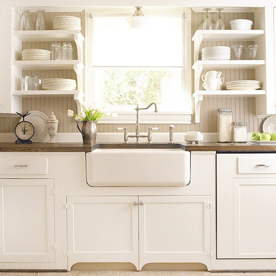 If you have always loved the look of a farmhouse inspired kitchen but aren't ready to rip out your old (or new) cabinets and countertops, there is a way to add a few inexpensive elements that can give you the feel you want! Get 7 INEXPENSIVE tips to help give your kitchen a farmhouse feel!