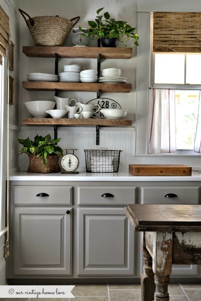 If you have always loved the look of a farmhouse inspired kitchen but aren't ready to rip out your old (or new) cabinets and countertops, there is a way to add a few inexpensive elements that can give you the feel you want! Get 7 INEXPENSIVE tips to help give your kitchen a farmhouse feel!