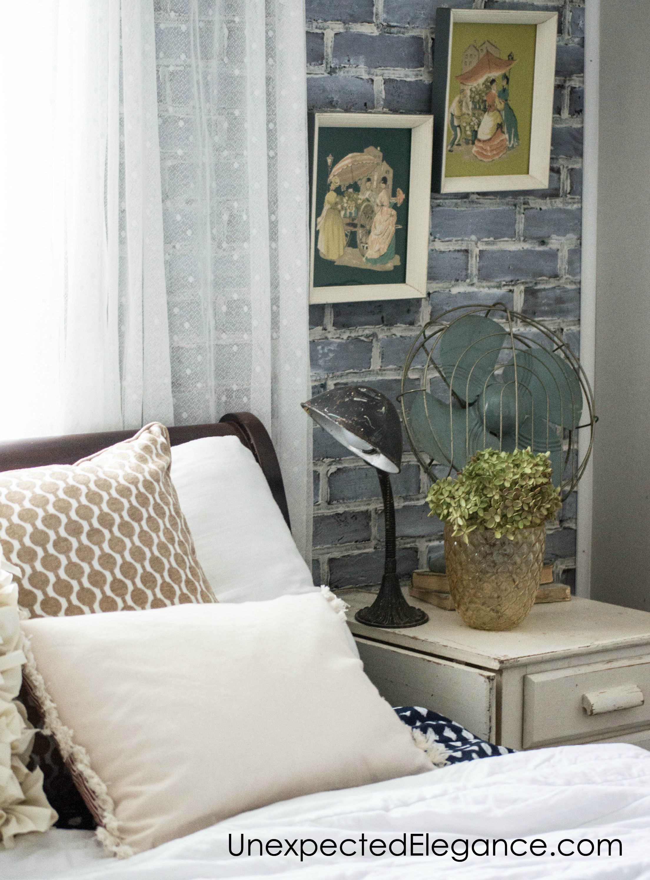Check out this loft-inspired makeover! A few economical changes to a guest bedroom completely changed the feel.