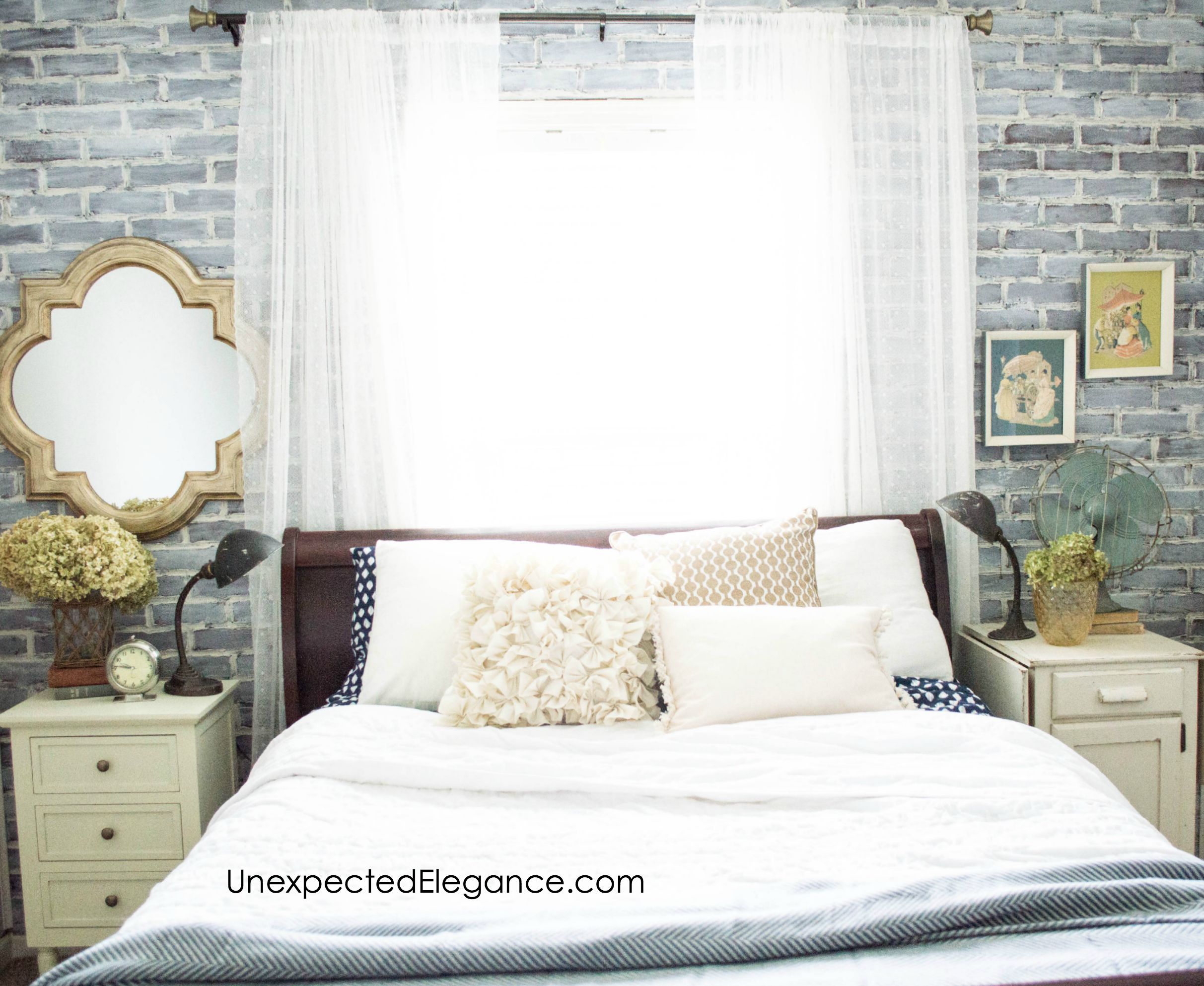 Check out this loft-inspired makeover! A few economical changes to a guest bedroom completely changed the feel.