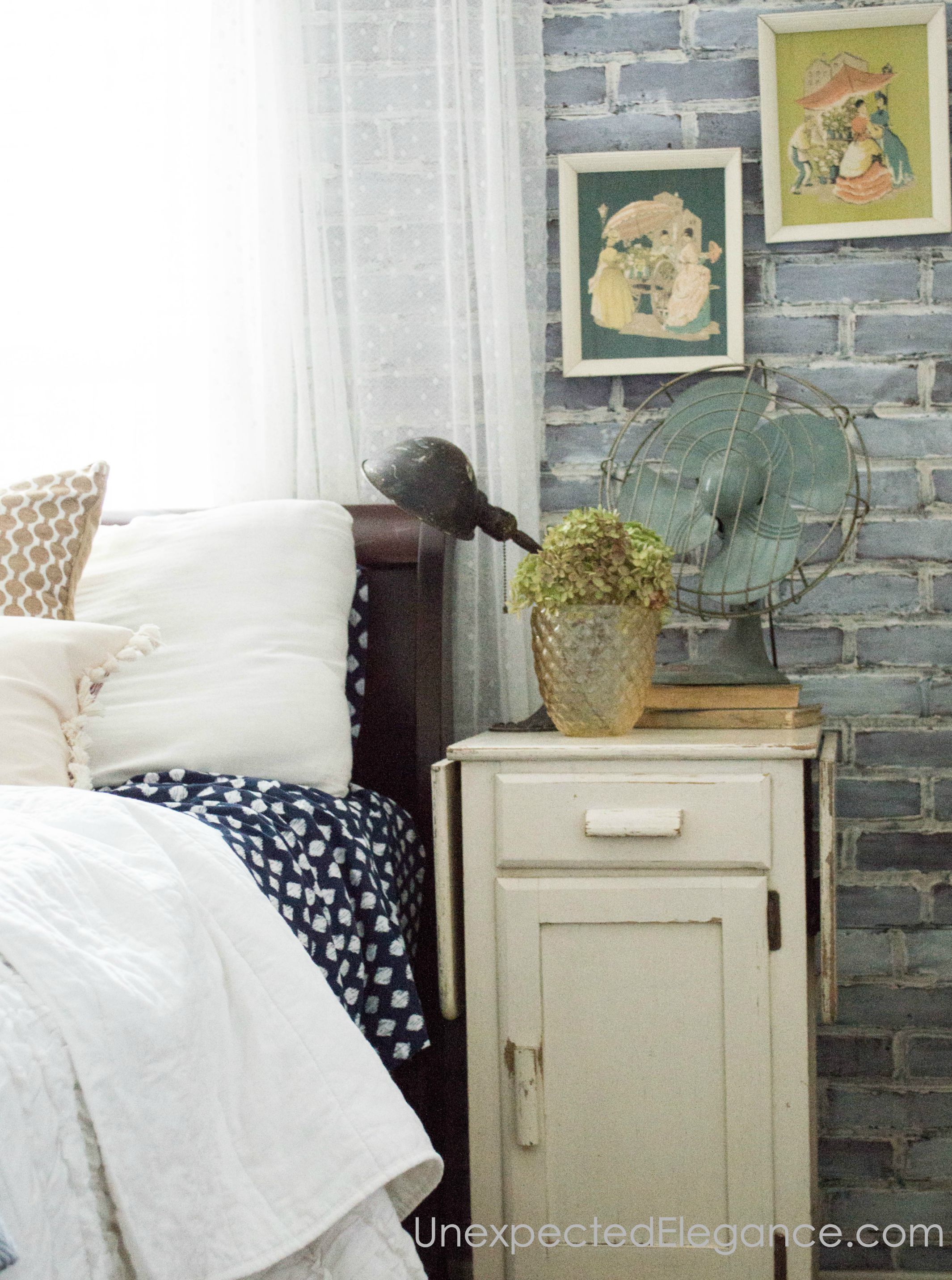 Check out this loft-inspired makeover! A few economical changes to a guest bedroom completely changed the feel.