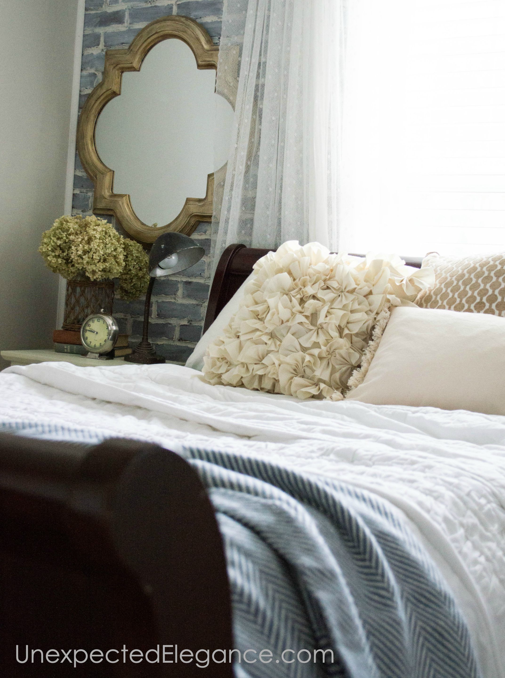 Check out this loft-inspired makeover! A few economical changes to a guest bedroom completely changed the feel.