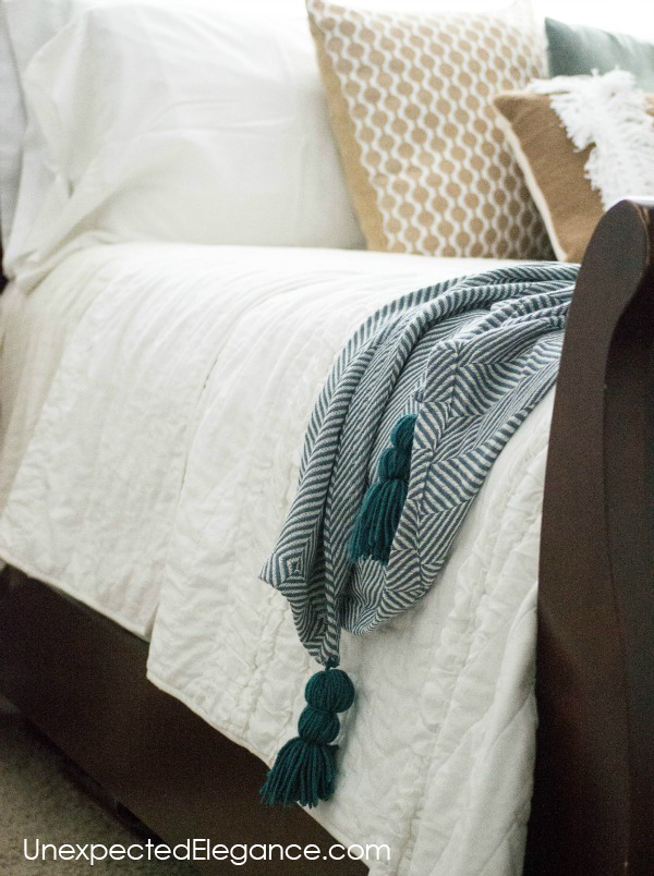Do you love pom-poms and tassels??  See how easy it is to add them to blankets!!