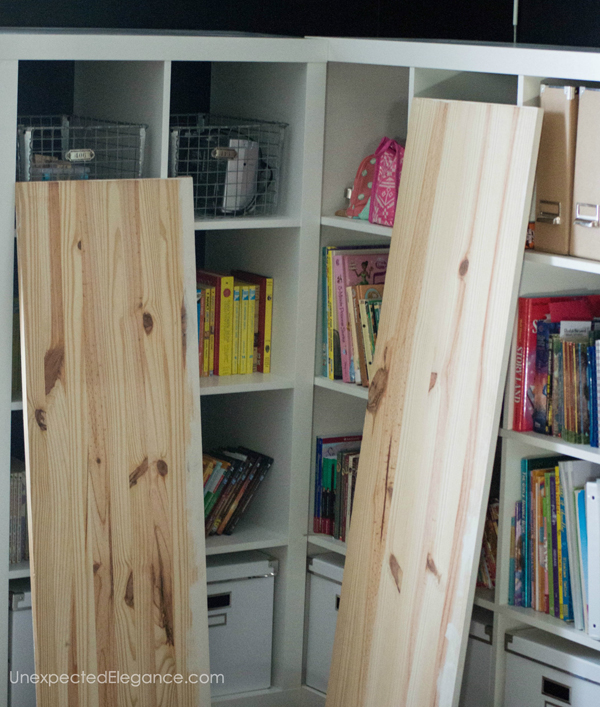 Do you have a corner of a room that needs some storage? Check out this EASY corner cabinet IKEA hack, to turn inexpensive shelving into a corner storage unit.