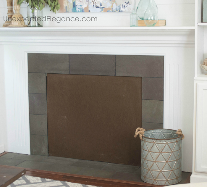 Stacked log fireplace insert tutorial...perfect for adding texture to your space.