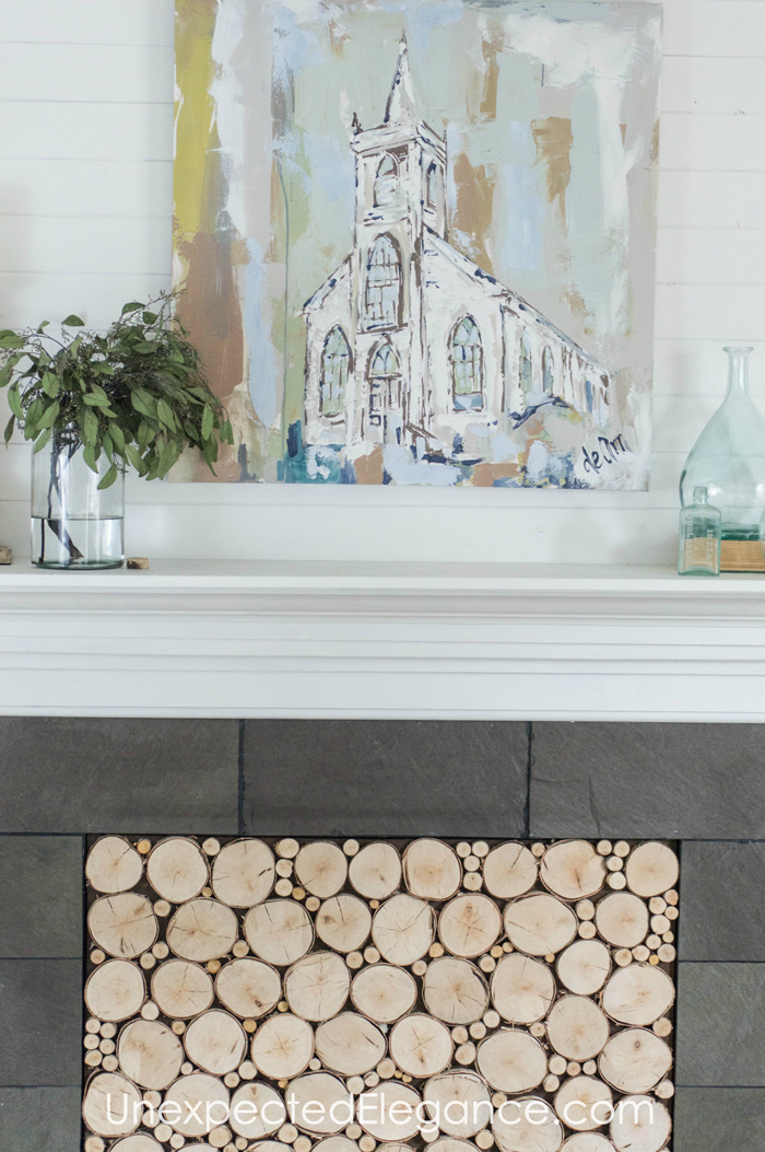 Want to add interest to your fireplace? Get a quick and easy tutorial for creating a faux woodstack insert! It's also a great way to keep out drafts.