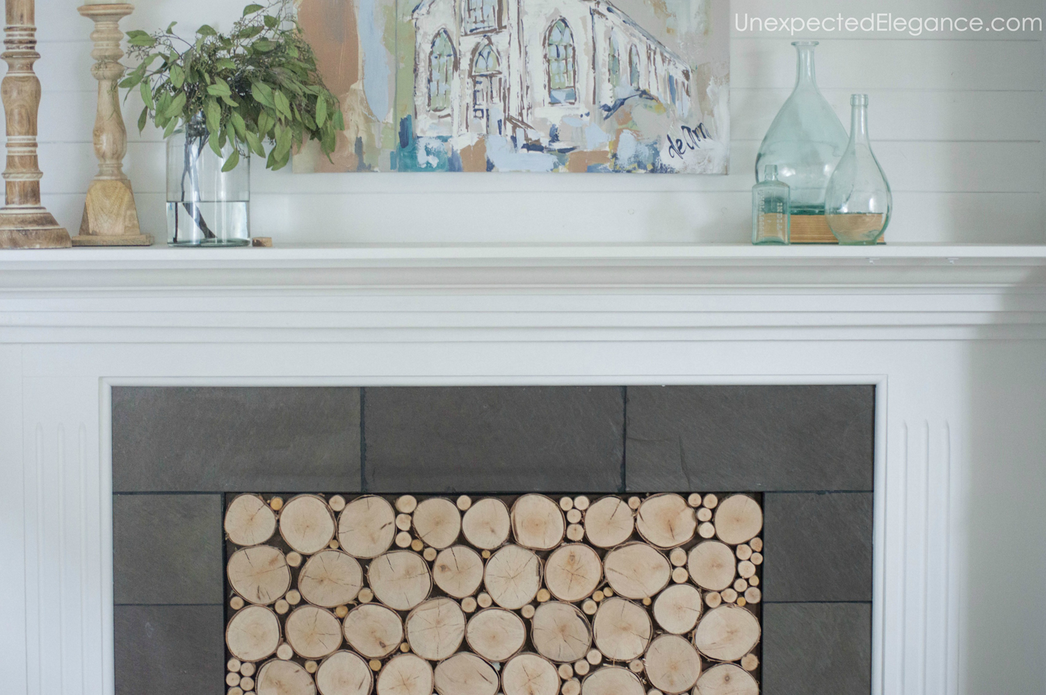 This stacked logs in fireplace tutorial, is great for adding texture to your space AND helping to stop drafts!