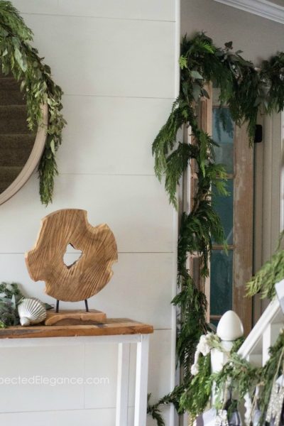 Decorating with greenery for Christmas is one the best ways to add a festive vibe to your home! Get a professional look without spending a lot of time.