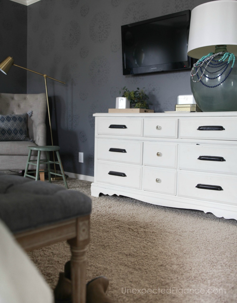 Check out this master bedroom refresh! By using things you already have and cleaning out the clutter, you can have a new space without spending any money!