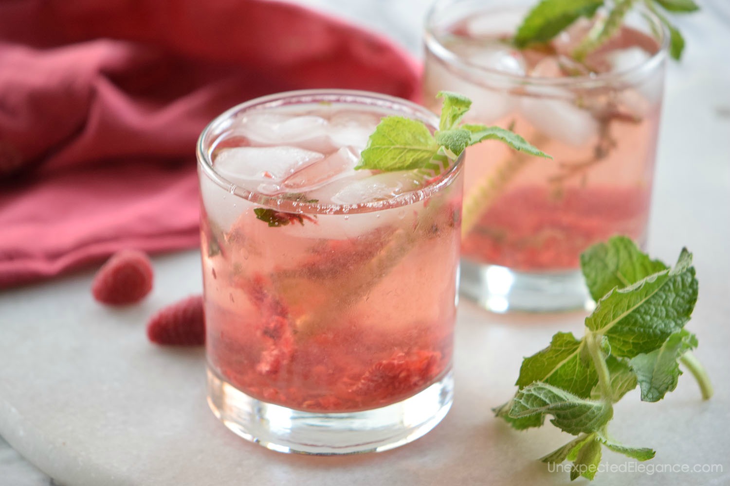 Mojito Mocktail recipe with raspberries.