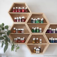 Need an organization system for your oils?? Check out this DIY essential oil wall storage system. It's not only functional but it's also pretty!