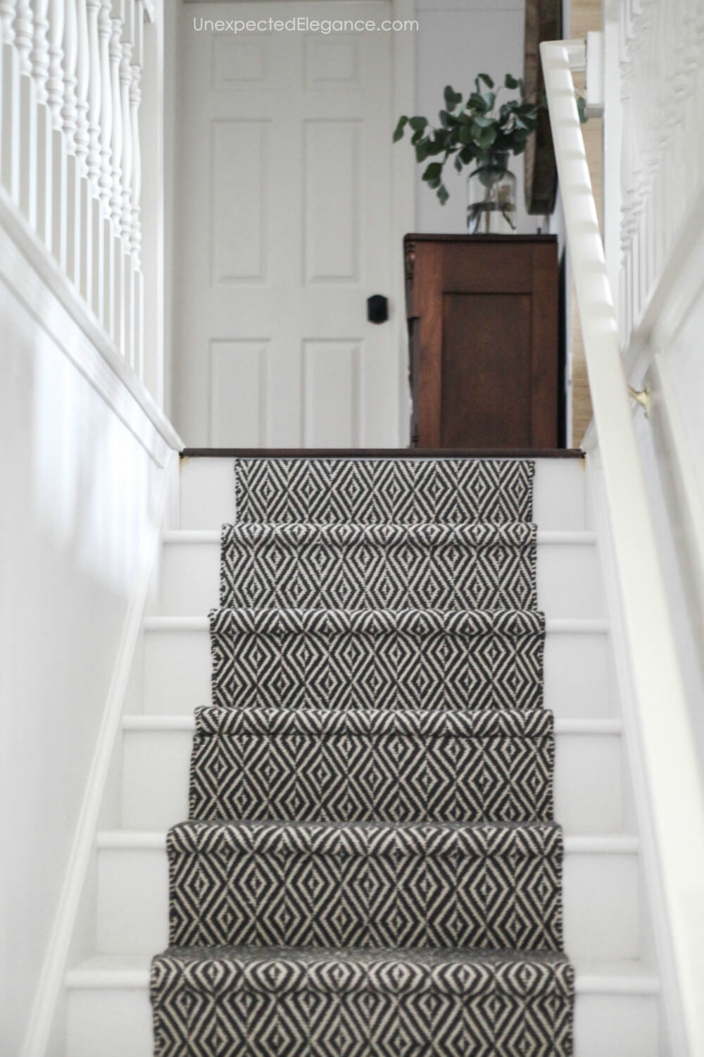 Check out this tutorial on how to replace your outdated carpet with an inexpensive stair runner.