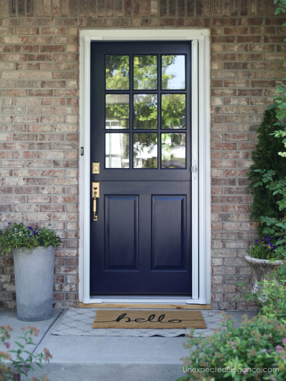 Dutch Door with retractable screen...genius! Check out this perfect solution for keeping the bugs out with distracting from the beautiful door.