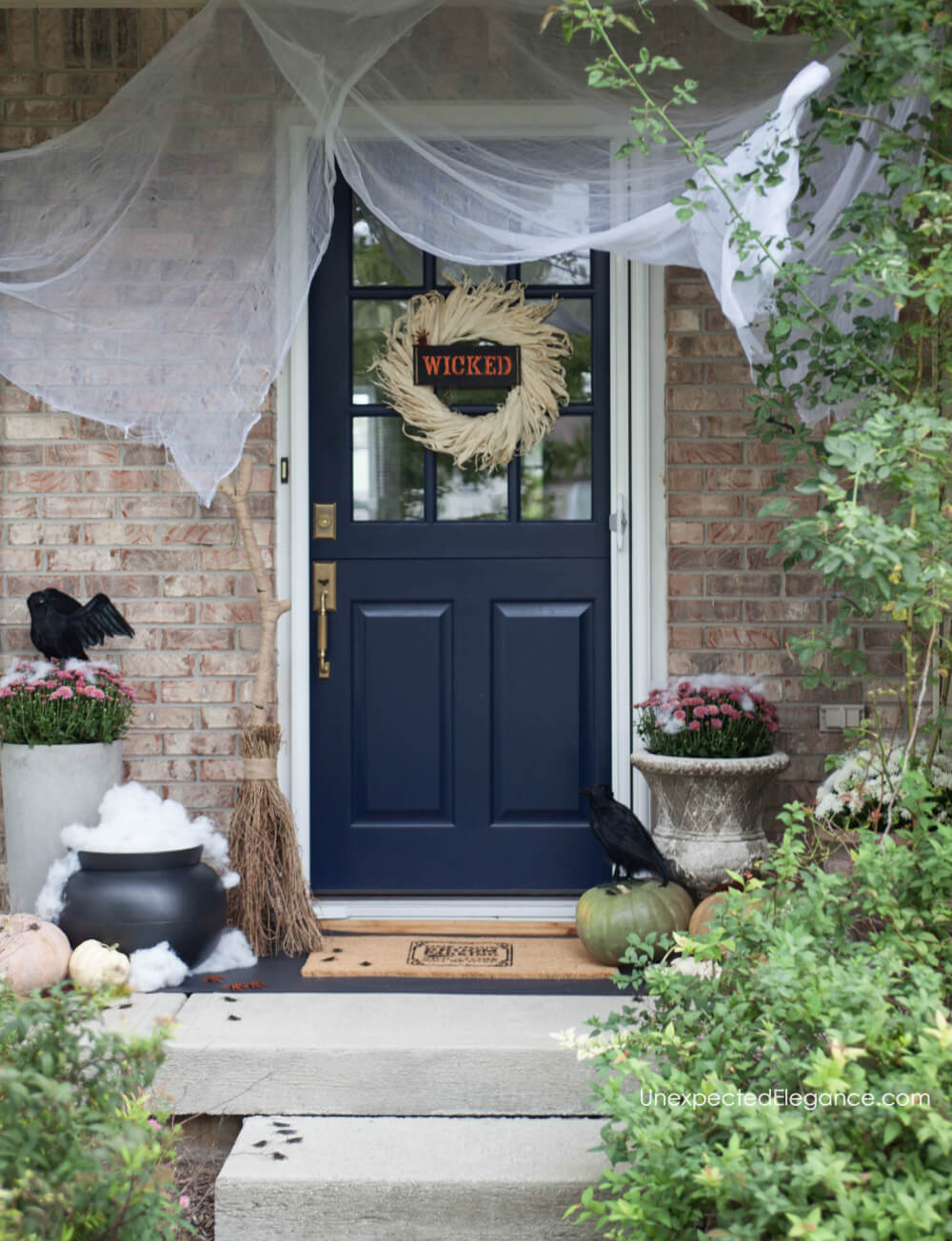 It’s finally fall! Check out this porch decked out for Halloween with a WICKED theme! 