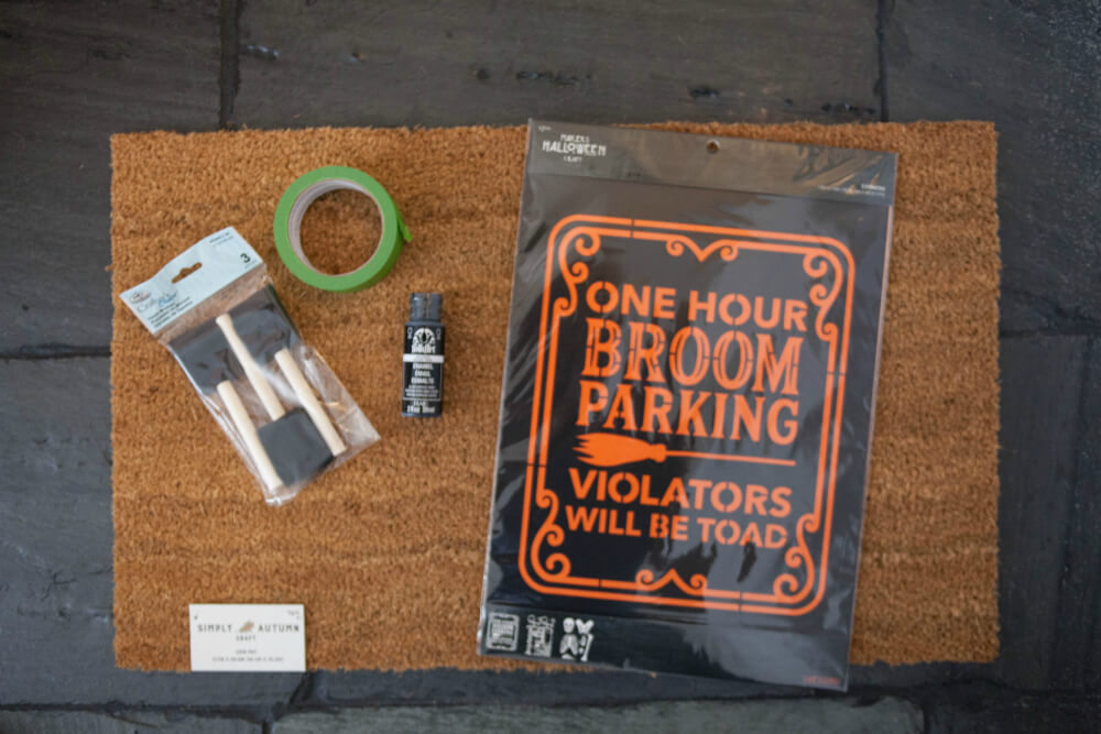 Supplies for DIY Halloween door mat.