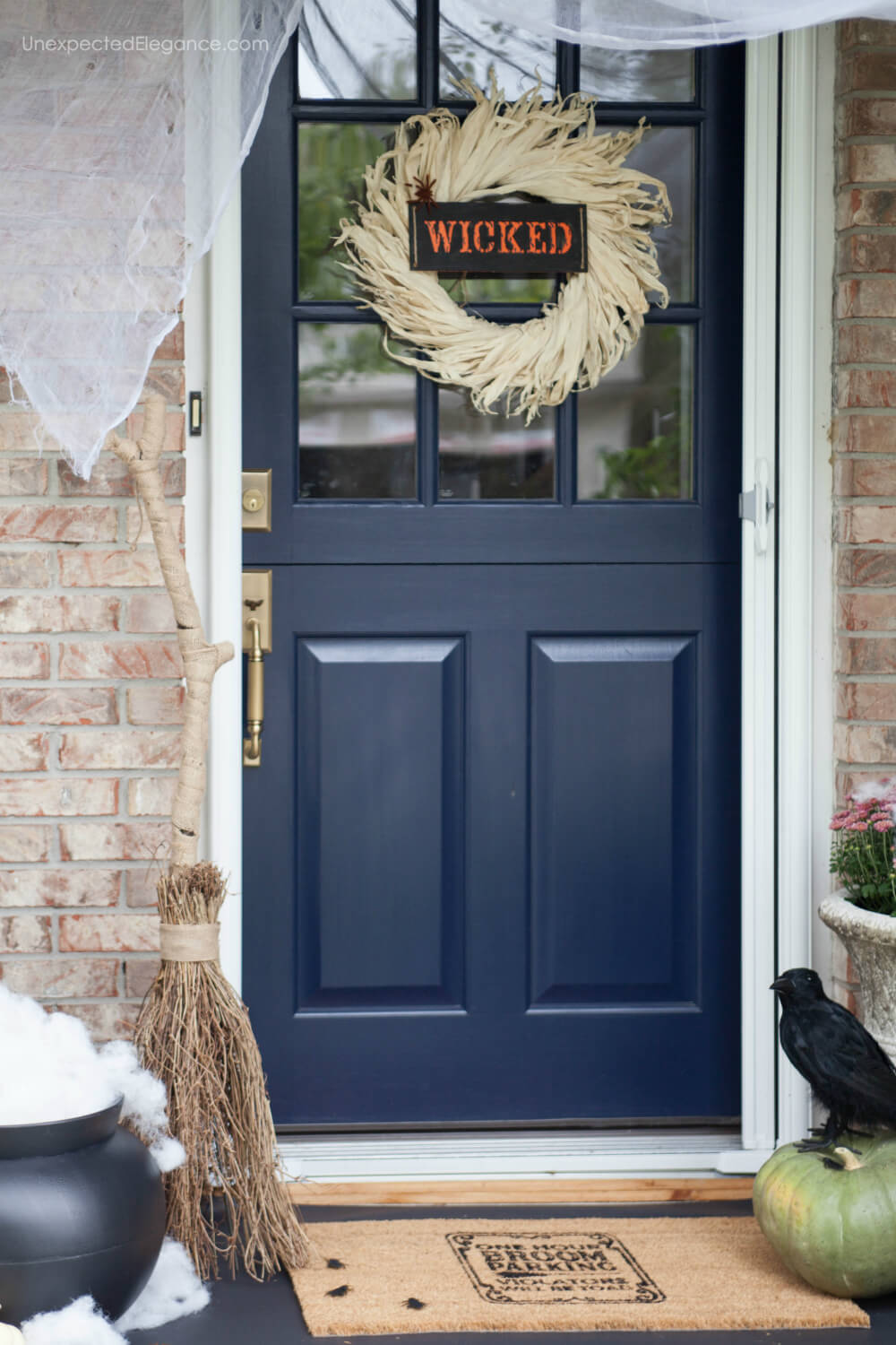 It’s finally fall! Check out this porch decked out for Halloween with a WICKED theme! Also get the tutorial for the cute doormat and “smokey” cauldron. 