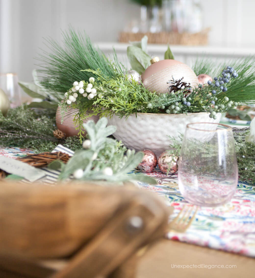 Can you believe this is faux greenery?  Get all the details for this easy and fun holiday table.