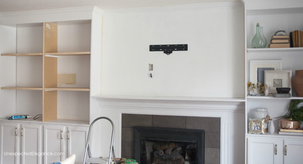 How to hang your tv over the mantel and hide the cords!